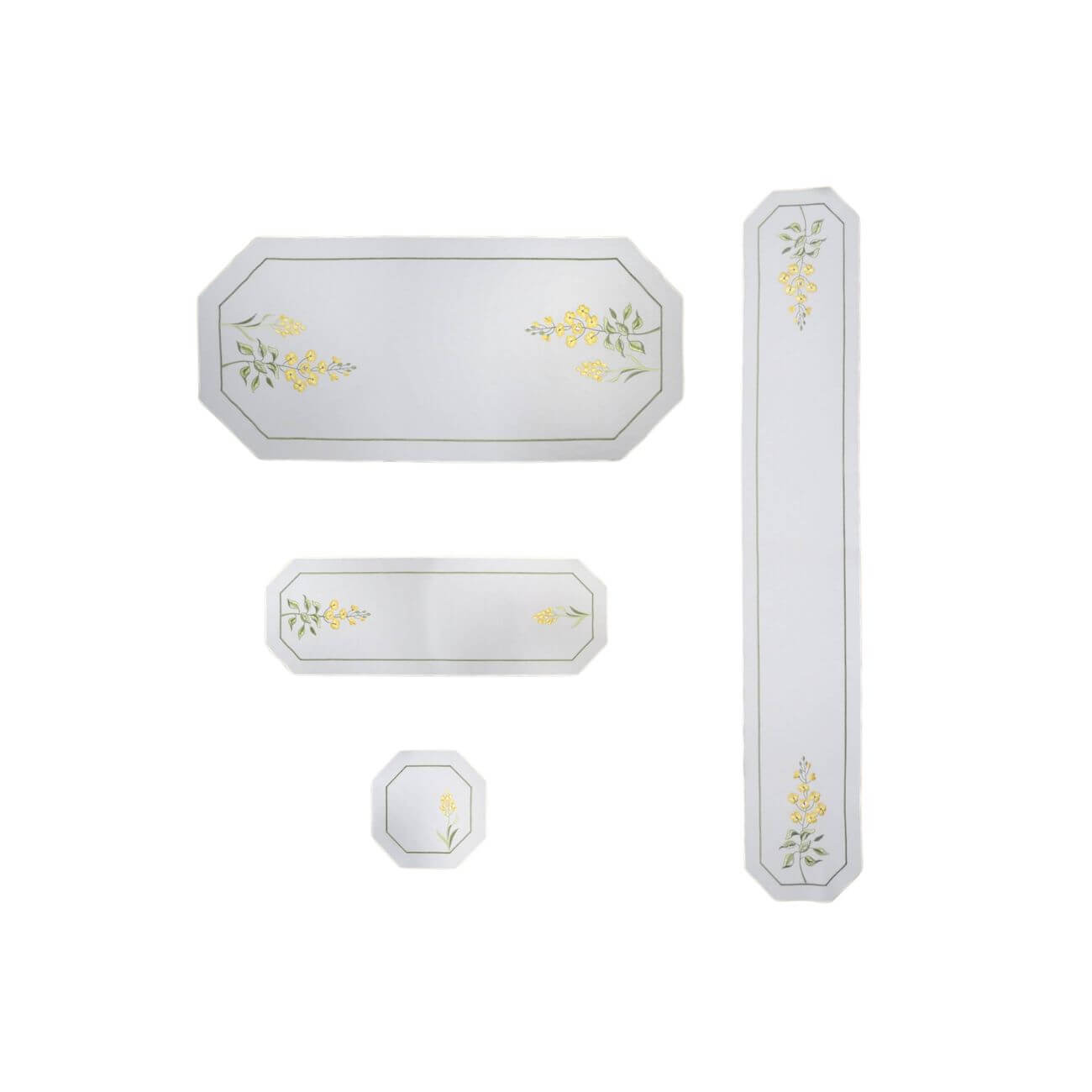 Summer Meadow Collection table linens, including linen table runners, square doily, and tablecloth, embroidered with yellow flowers, Swarovski crystals, and green stems. Displayed together in a bright, elegant setting. Made in Germany.