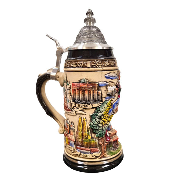 side of 1-liter German beer stein with  edelweiss rim, city reliefs, Berlin, Neuschwanstein, Nuernberg, Koeln, and pewter lid.