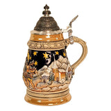 side of German beer stein with Santa sleigh scene, snowy village, starry sky, and domed engraved pewter lid.