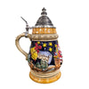 side of German beer stein with Santa sleigh scene, Christmas banner, starry sky, and domed engraved pewter lid.