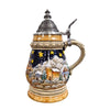 side of German beer stein with Santa sleigh scene, snowy village, starry sky, and domed engraved pewter lid.