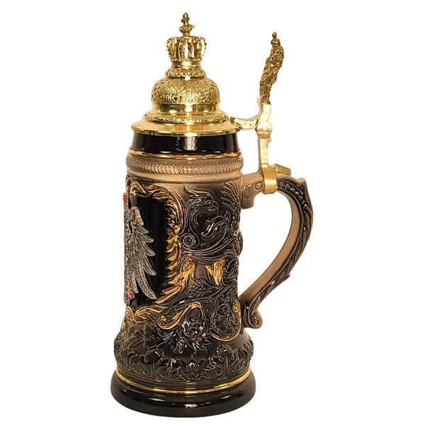 side of German beer stein with raised Imperial Eagle and coat of arms, topped with gold-colored crown-shaped pewter lid, 0.5L capacity.