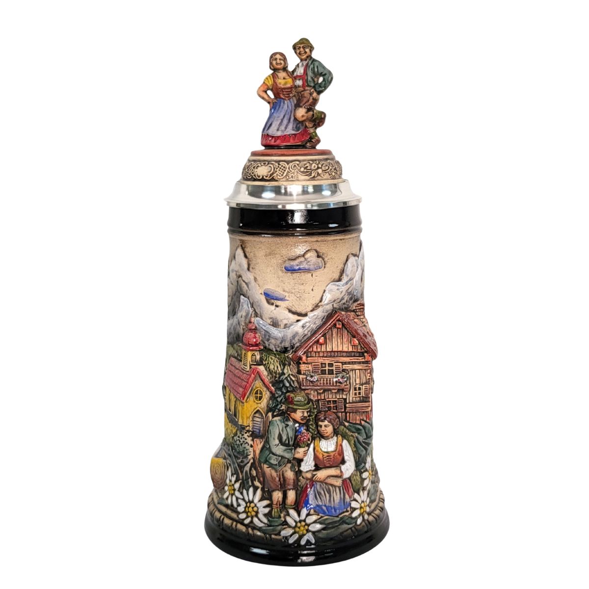 1-liter German beer stein with alpine couple, edelweiss flowers, mountain chalet, chapel, and pewter lid with dancing Bavarian figurines.

