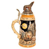 side of Wolf-themed German beer stein close-up of a wolf's face staring directly ahead, and pewter lid topped with a hand-painted wolf figurine.