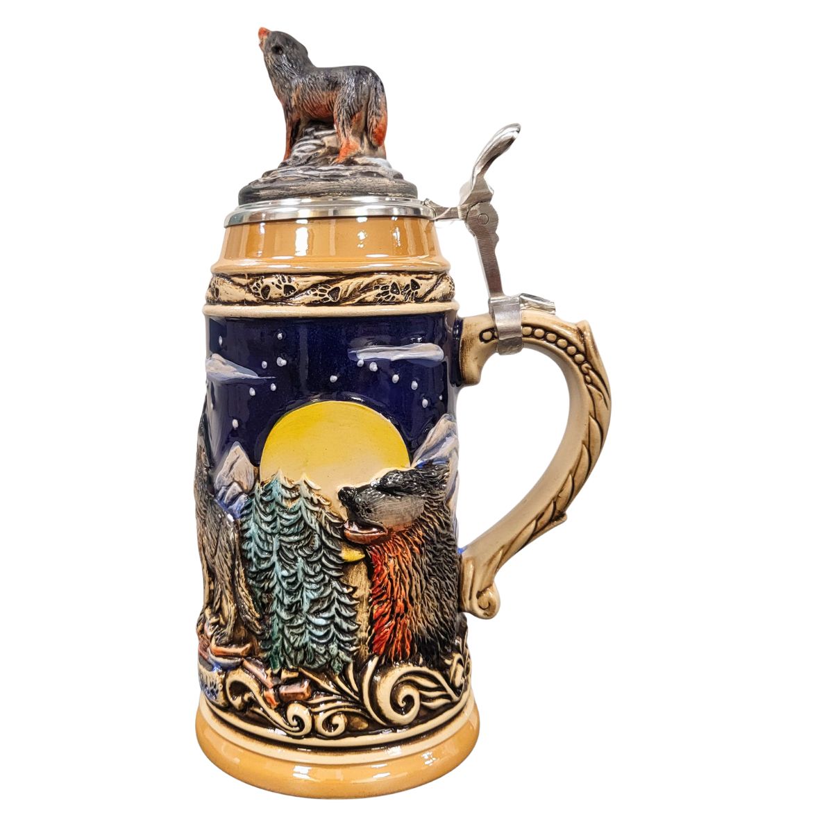 side of Wolf-themed German beer stein close-up of a calm wolf with eyes closed, posed in front of a glowing full moon, and pewter lid topped with a hand-painted wolf figurine.