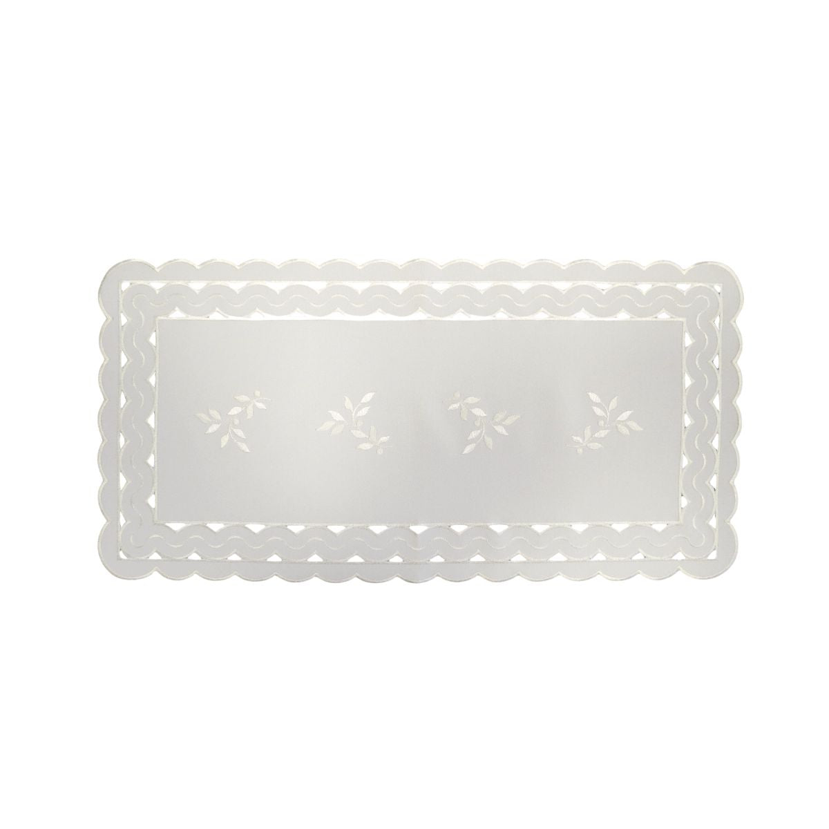 White linen table runner with scalloped cutwork edges and subtle leaf tendril embroidery