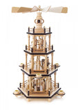 This 4-tier hand-carved Christmas pyramid features a nativity scene on the first tier, angels and villagers on the second tier, Roman soldiers on the third tier and carved designs on the fourth tier. There are candle holders on the first and second tier giving the entire pyramid a rich glow.