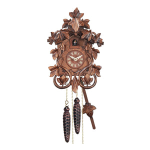 Traditional Engstler Black Forest Cuckoo Clock framed by ornate Ivy Leaves and Cuckoo Bird in open Door
