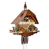 Right side view of the August Schwer Black Forest 8 Day Chalet Cuckoo Clock With Music, Dancers, Spinning Water Wheel, and Frolicking Rabbits