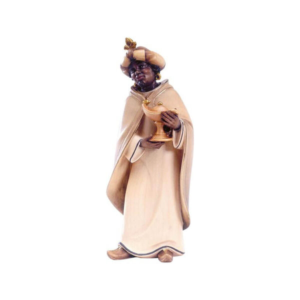Sculpted wooden Black King figurine for Artis Nativity set.. He's dressed in a flowing robe and cloak, with a turban hat, and holding a golden lamp.