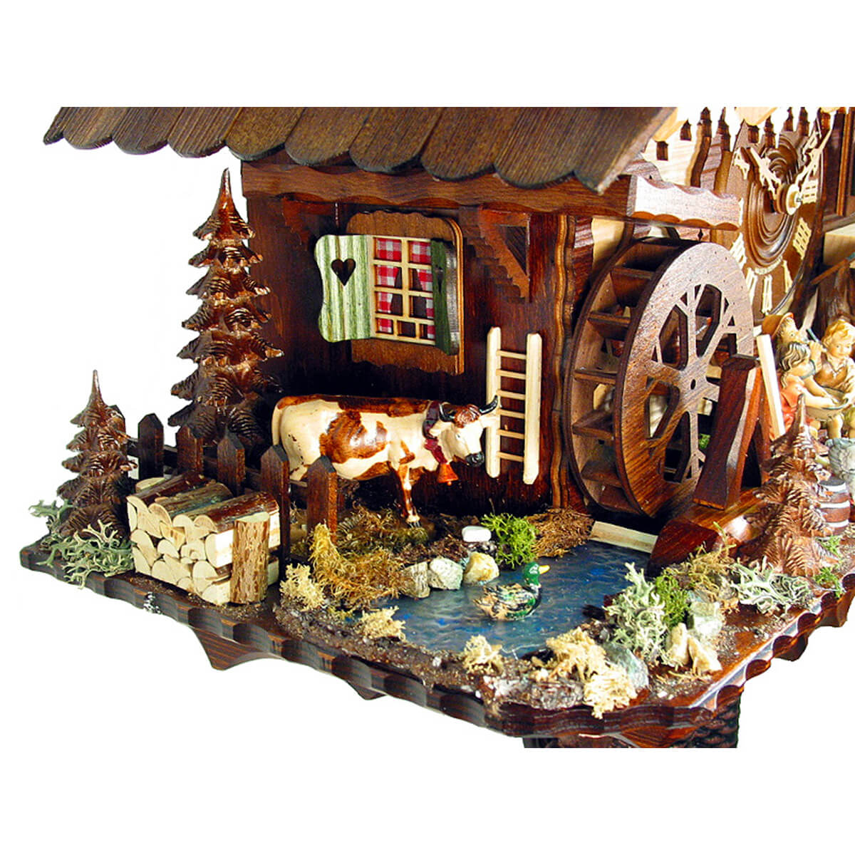 Zoomed in view of the cow on one side of the clock