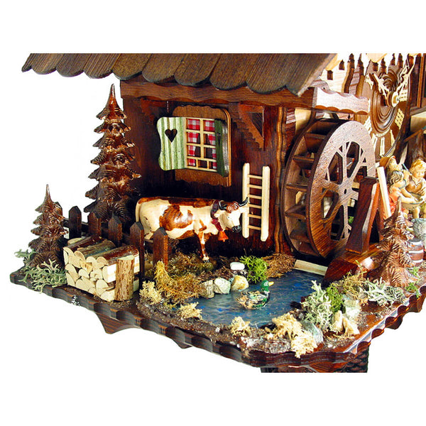 Zoomed in view of the cow on one side of the clock