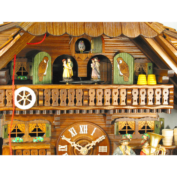 Zoomed in view of the dancers, featured towards the top of the clock above the face.