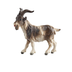 The PEMA Kostner Nativity Billy Goat is a detailed figurine hand-carved out of wood and hand-painted. It features a realistic grey and white coat and horns making it an elegant addition to any holiday scene.
