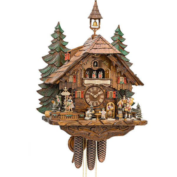 8-Day Cuckoo Clock featuring turning dancers, a rustic tavern design with a small bell tower, and traditional red shutters, surrounded by green trees, showcasing a charming Black Forest aesthetic.