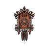 Handcrafted Hönes 8-day Black Forest cuckoo clock in classic railroad station house design with detailed scrollwork and contrasting wood tones.