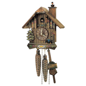 1-Day Schneider Black Forest Chalet Coocoo Clock without music. There is water trough and pump on the right and an evergreen tree on the left. The clock dial sits in the middle and the cuckoo comes out behind his door at the full and half hour. The chimney sweep pops out of the chimney stack on the right as the coockoo calls. The roofline is smooth. A painted Edelweiss flower is painted across the base. More floral accents decorate the wooden panels on the upper half of the house.  