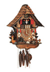 1-Day Schneider Chalet Coocoo clock with a wood chopper in front of a little fence and a tree on the right. There is a pile of logs in the middle and a turning water wheel, wooden water fountain and trough on the left with an evergreen tree. The dial is flanked by two windows with red shutters. The dancers dance on top of a balcony. There are two red shutters beside the dancers. The cuckoo bird comes out behind his door above the dancers under the curved roof made out of wooden shingles.