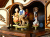 Boy with a Stick and a Deer dancing with three other Children on a Schneider Chalet Cuckoo Clock