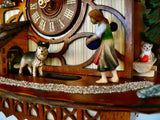 Girl Playing Ball with a German Shepherd while Cat is watching on a Schneider Chalet Cuckoo Clock