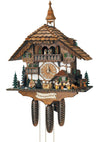 8-Day Schneider Chalet Coocoo clock with music. The timbered clock is white with dark beams on the lower half and dark wood on the upper half. The plaque underneath reads Schwarzwaldhof or Black Forest manor. A couple is kissing next to a water wheel and trees. A dog is watching men drinking beer at a table, 2 deer are eating on the right. The dancers spin on the balcony decorated with evergreen tree railing. A bell tower sits on top of the shingled roof.