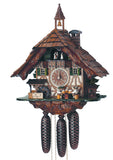 8-Day Schneider Black Forest coocoo clock with music. The chalet is white with dark wooden timbers in the lower half and a dark wooden upper half. Four men are tapping their beer steins at a table. There is a water well behind a stone wall on the left and green fir trees on the right. Dancers spin above a wide balcony. There is a bell tower and a chimney on the shingled, rustic roof.