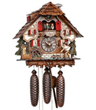 8-Day Black Forest Chalet coocoo clock with music. The chalet has a stone base and a solid dark wood middle section with a white upper section with curved brown timbers. Each side has a green tree. The left features a water pump and trough and a water wheel. A fisherman on the right fishes from a small pond, a fish watches with its head sticking out of the water. Four windows have red shutters and flower boxes. The dancers spin above an ornate balcony. The shingled roof has a dormer window and a chimney.