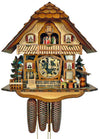 8-Day Black Forest Chalet coocoo clock with music. The house has a stone section at the bottom and a two-tone wood façade. On the right, there is a tree and a shed where beer barrels are stored. A cat is sitting on the roof of the shed. A Bavarian couple is sitting at a table enjoying a beer. On the left, there is a fenced-in tree with a waterwheel. The highlight of the clock is a clear glass dial so you can see the movement gears behind. Dancers spin on top of the wide balcony. The roof has shingles. 