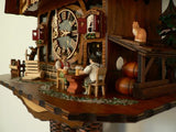 Cat watching a Couple Drinking Beer next to a Handcart and a Water wheel on a Schneider Cuckoo Clock