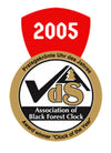Detail showcasing the 'Cuckoo Clock of the Year 2005' award from the Association of Black Forest Clock, highlighting the Rombach & Haas craftsmanship.