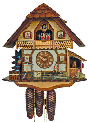 8-Day Black Forest Chalet coocoo clock. The clock is white with timbers, the lower section looks like stone, the upper has light wood. Behind the left corner fence is a water wheel and a tree. Some tools lean against the house next to a pile of wood. A farmer with a pitchfork carries hay. On the right, there is a horse in his little barn, a young girl sits atop a small pile of hay. Above the dial is a wide balcony where dancers spin. Four windows have red shutters and flower boxes. The roof has shingles.
