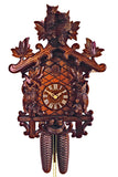 8-Day Traditional Black Forest coocoo clock. The face of the brown wooden clock around the dial is crosshatched. There is a delicate trellis around the edge of the clock with leaves growing on a vine around it. On the left and right side of the clock sits a wide-eyed owl looking at the viewer. On the top crown piece of the clock there is a nest with two baby owls surrounded by leaves.