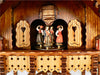 Dancers in traditional Black Forest Clothes dancing on Top of an Anton Schneider Chalet Cuckoo Clock