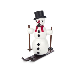 This charming Dregeno Smoker – Skiing Snowman is sure to be a hit for the winter season. Handcrafted from wood in Germany, the delightful snowman features a black top hat, a red scarf, and is skiing on skis while holding poles and smoking a pipe. Give the gift of joy with this unique piece!