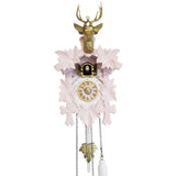 Quartz traditional Engstler clock in pink, gold, and white with pink leaves and a gold stag's head on top of the crown.