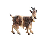 The Kostner Nativity goat is the perfect addition to your home's holiday decorations. Adorned with a bell collar, this shaggy brown and white goat is hand-carved out of wood and hand-painted. The goat looks right and has impressive horns. Witness the joy of the season with the stunning craftsmanship of this goat!