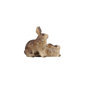 This beautiful PEMA Kostner Nativity Group of Rabbits is carved out of high-quality wood and hand-painted with intricate detail. This set includes two rabbits, one is lying down and looking forward, the other rabbit is sitting on his hindlegs with his ears up, also looking straight ahead. The lifelike animals are sure to bring joy to your home. 