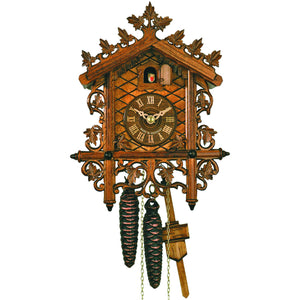 Intricate carved Ivy Vine framing a Traditional Station House on a Hekas Black Forest Cuckoo Clock