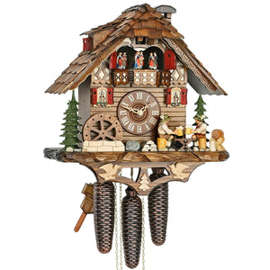 Two Bavarian Men drinking Beer next to a Keg in front of a Chalet on a Hekas Black Forest Cuckoo Clock