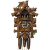 Five Ivy Leaves frame a Traditional Hekas Black Forest Cuckoo Clock with an ornate carved Bird on Top