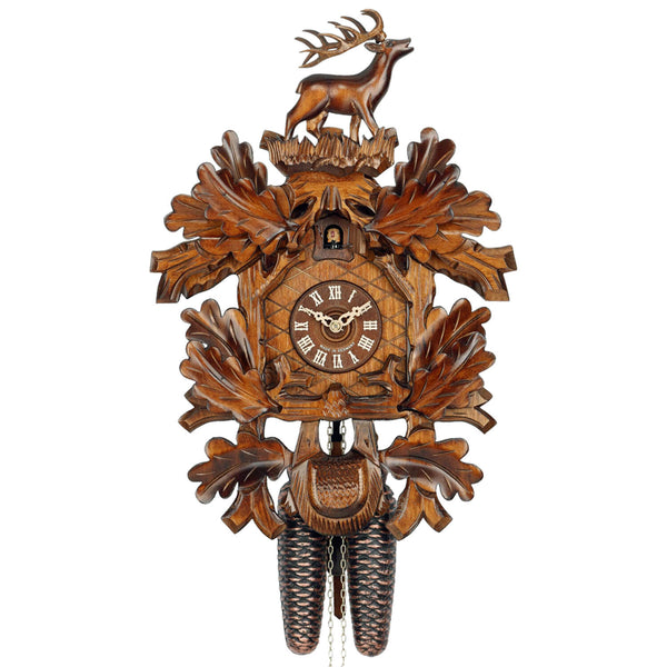 Traditional Hekas Black Forest Cuckoo Clock framed by Oak Leaves with a roaring Stag on and a Hunting Bag