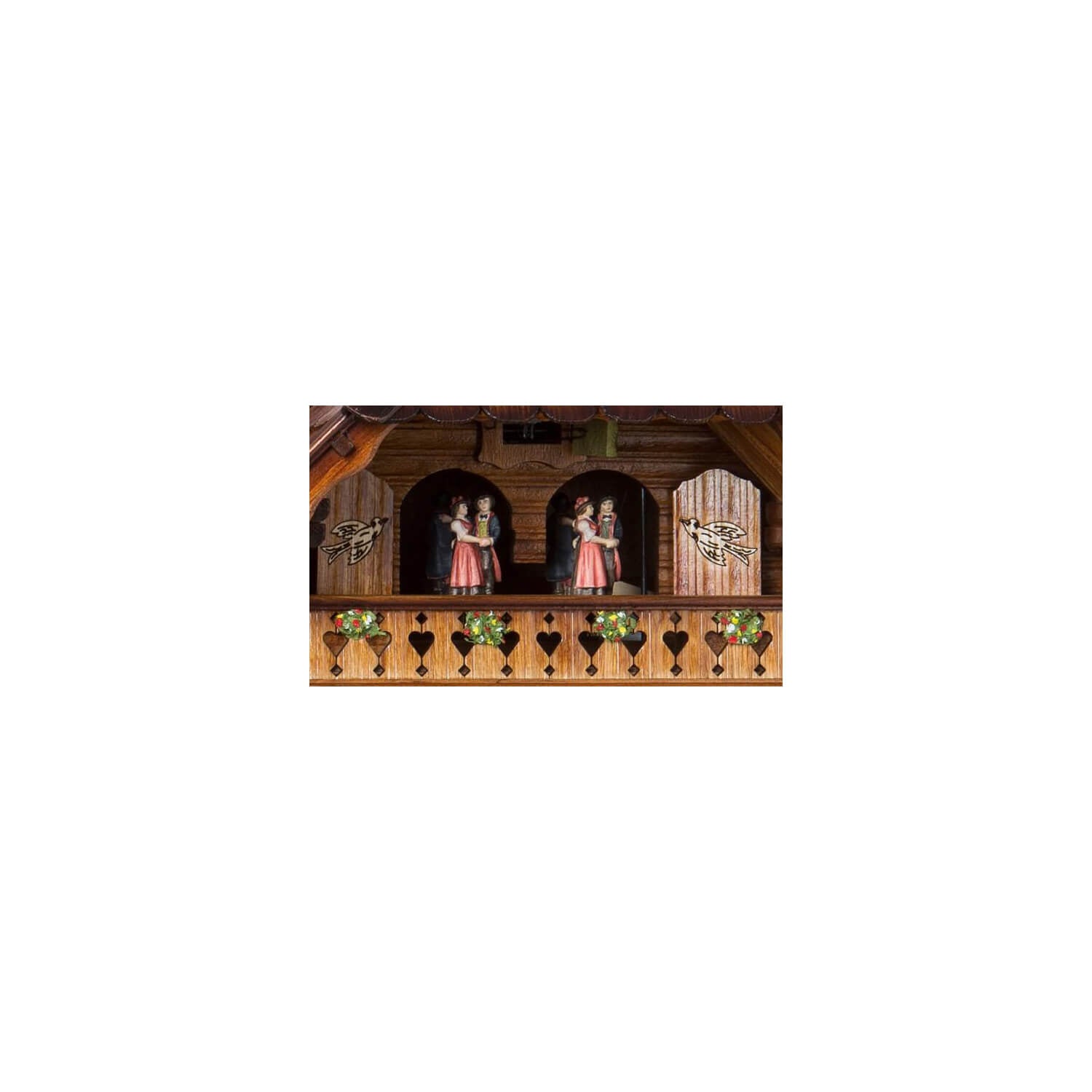 Zoomed in picture of the dancers, featured above the face of the clock