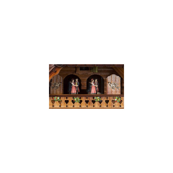 Zoomed in picture of the dancers, featured above the face of the clock