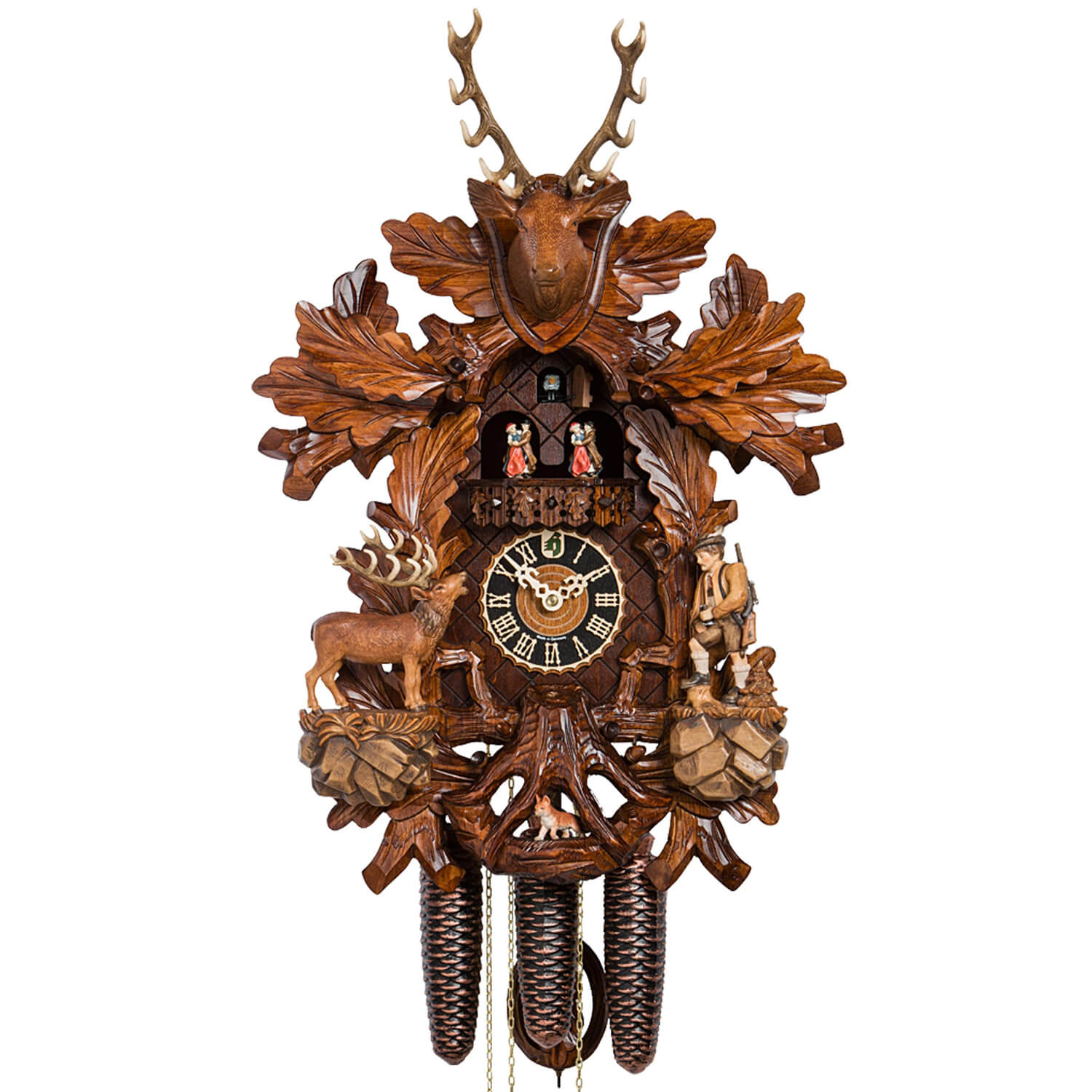 Painted 8-Day Cuckoo Clock featuring a detailed hunter raising binoculars to observe a majestic stag. Below, charming dancers in traditional Black Forest attire spin on the balcony. The clock is adorned with an impressive stag's head at the top and a hidden fox beneath the dial.