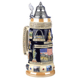 Colorful Landmarks on a dark based colored Beer Stein from KING. on the top rim are the Names of the States and on the bottom are Motifs of famous North American Wildlife. The Handle is engraved with the words "Land of the Free".