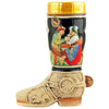 This handmade German beer boot stein in ivory and cobalt shows a traditionally dressed couple sitting on a bench engrossed in conversation.