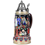 King Ceramic beer stein with pewter lid. The theme is the tree of life where each branch shows a moment in life. A young family takes a walk, a father holding a baby in his arms and a child by the hand, and a grandfather reading a book to his granddaughter. Bright colors make the beer mug a piece of jewelry.