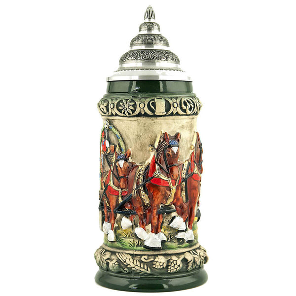 Green beer stein with pewter lid on which you can see Clydesdale horses pulling a cart with beer barrels.