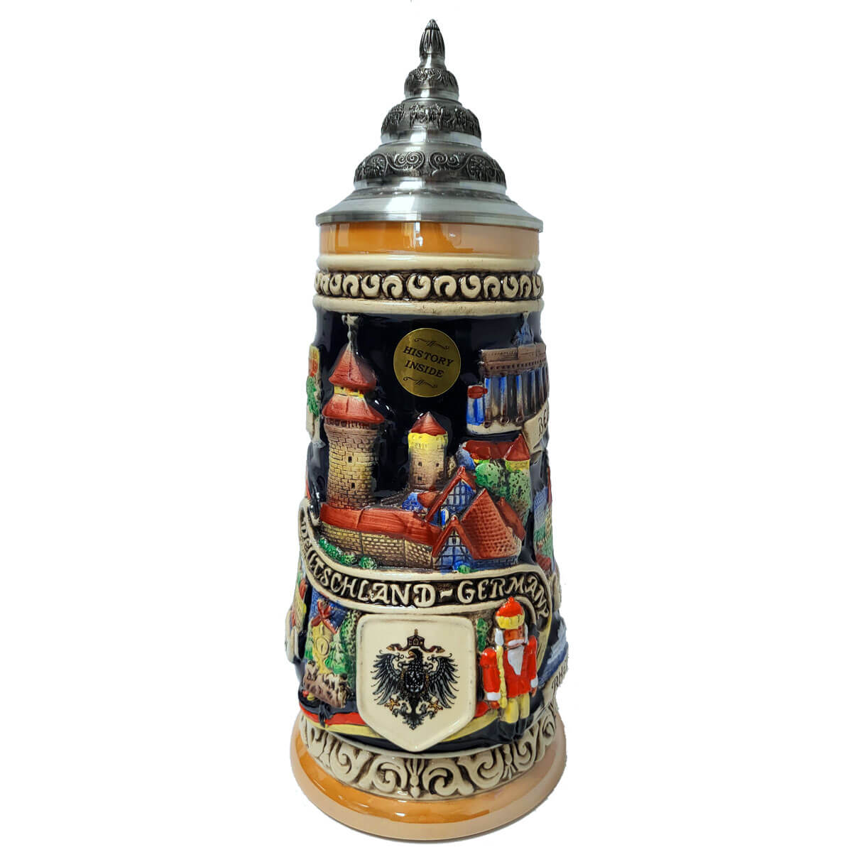 a dark colored King Beer stein with the Castle in nuremberg, an old German Eagle , a Cuckoo Clock and a Nutcracker colorful painted on the front. Pewter Lid on the top