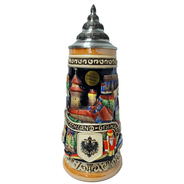 a dark colored King Beer stein with the Castle in nuremberg, an old German Eagle , a Cuckoo Clock and a Nutcracker colorful painted on the front. Pewter Lid on the top
